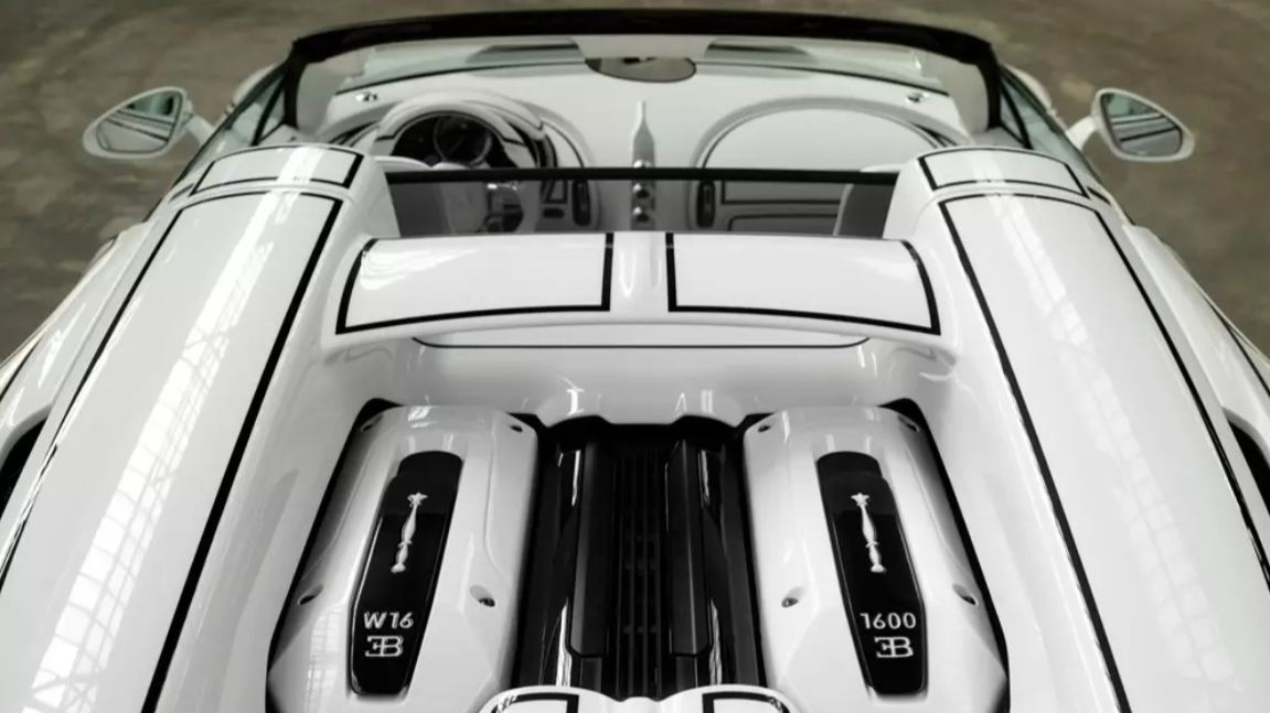 Nắp động cơ của W16 Mistral Blanc Éternel có những chi tiết bằng sứ. Ảnh: Bugatti. Nắp động cơ của W16 Mistral Blanc Éternel có những chi tiết bằng sứ. Ảnh: Bugatti.